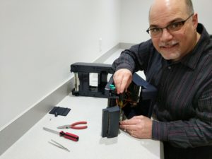 Neumann Marking Technician Fixing a Label Printer